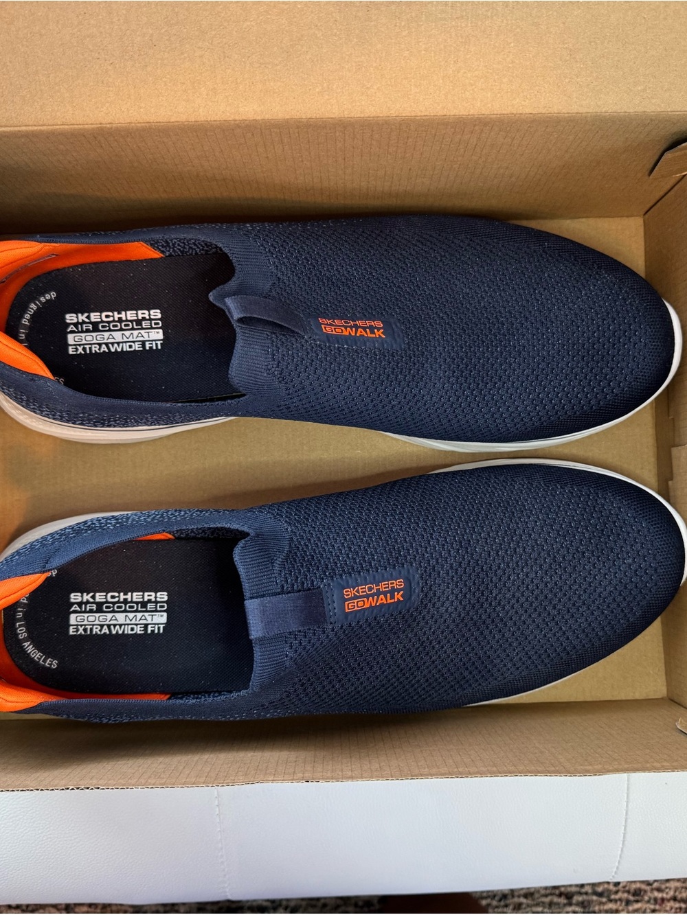 Skechers Go Walk Slip-On Sneakers in Navy - Size 16, never worn.